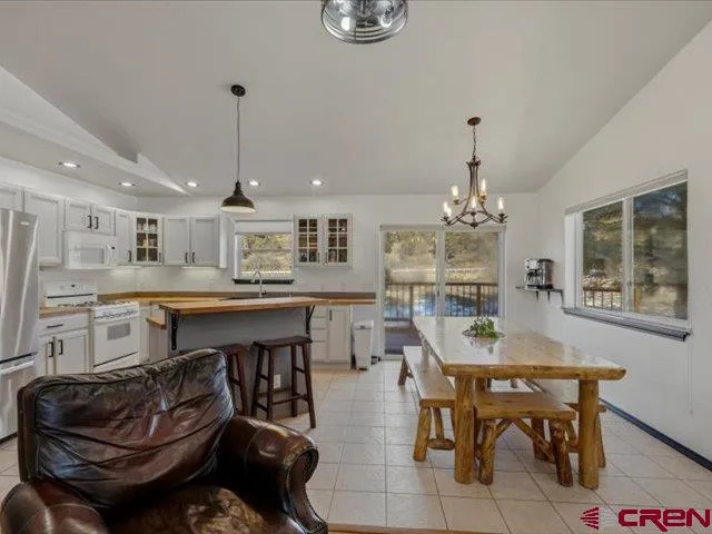 a view of a bedroom with wooden floor and closet