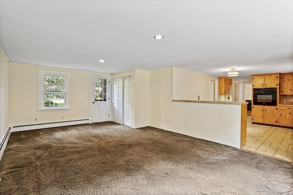 2 Jefferson Drive Acton, MA 01720 - Photo 13 of 38 an empty room with a empty space and windows