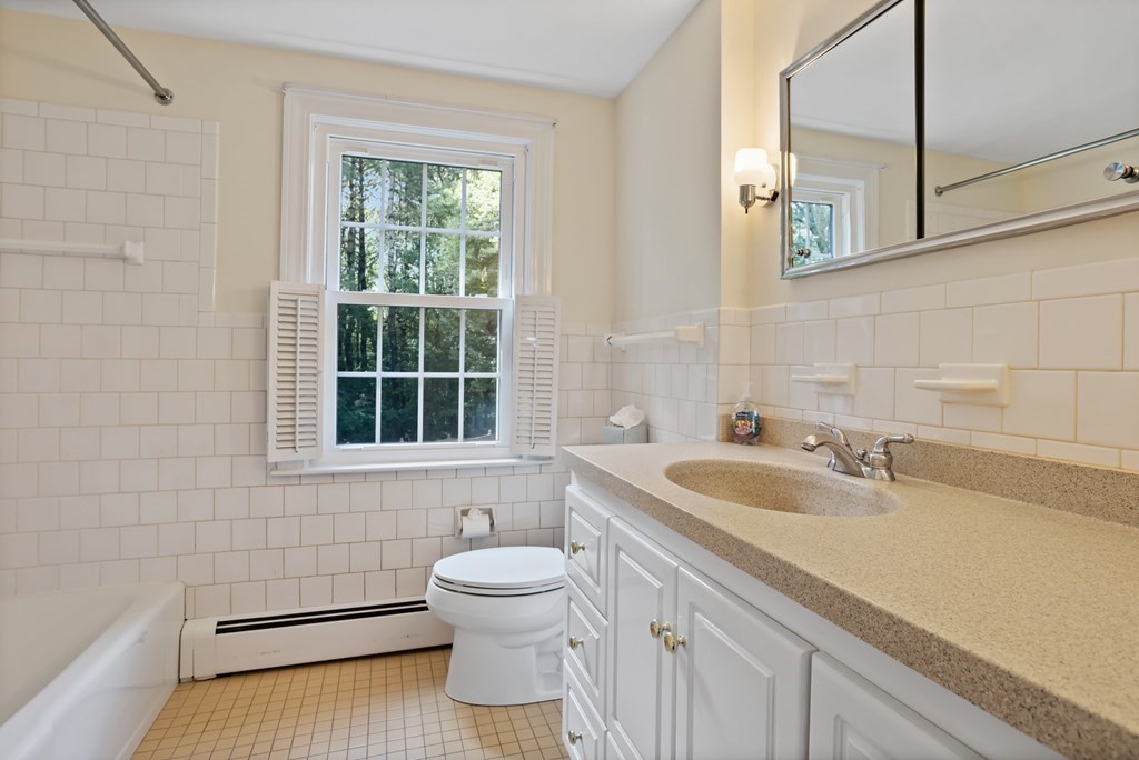 2 Jefferson Drive Acton, MA 01720 - Photo 29 of 38 a bathroom with a sink and a window