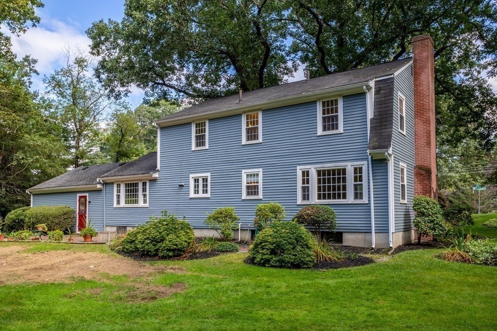 2 Jefferson Drive Acton, MA 01720 - Photo 33 of 38 a view of a house with a yard and plants