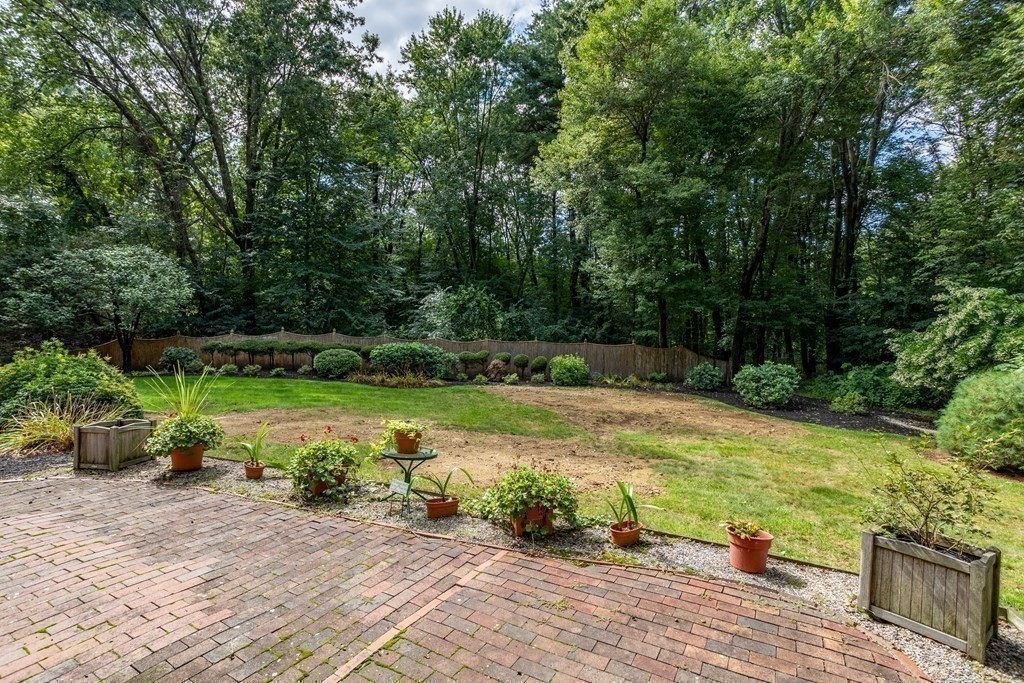 2 Jefferson Drive Acton, MA 01720 - Photo 35 of 38 a view of a garden with lawn chairs