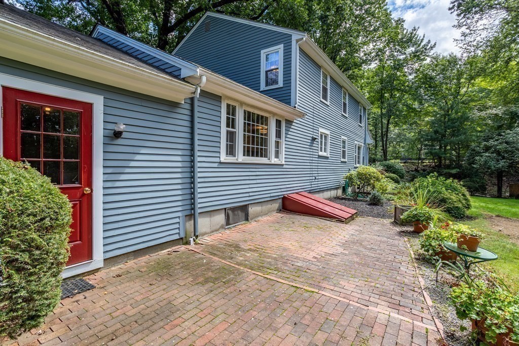 2 Jefferson Drive Acton, MA 01720 - Photo 37 of 38 a front view of a house with garden