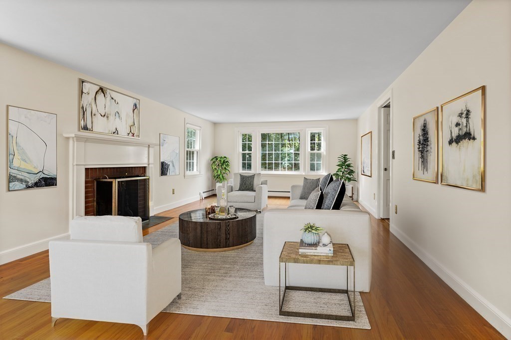 2 Jefferson Drive Acton, MA 01720 - Photo 5 of 38 a living room with furniture and a fireplace