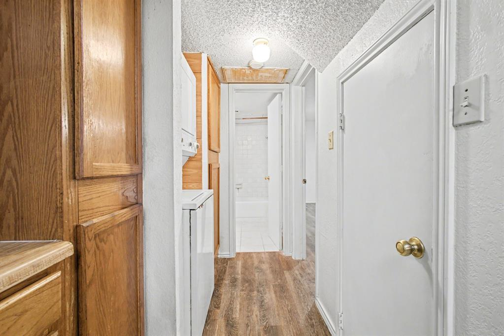 9827 Walnut Street, Unit 210 Dallas, TX 75243 - Photo 24 of 30 a view of a bathroom with a shower