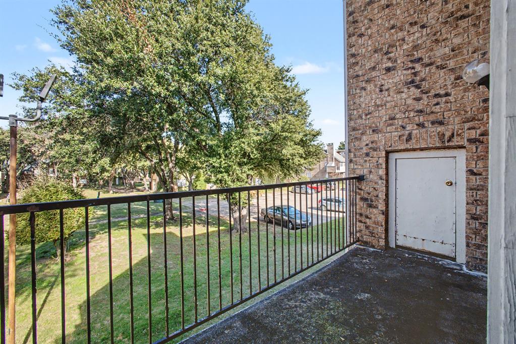 9827 Walnut Street, Unit 210 Dallas, TX 75243 - Photo 29 of 30 a view of a balcony