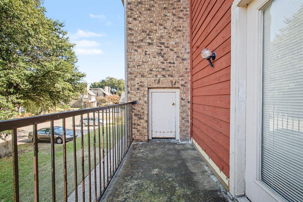 9827 Walnut Street, Unit 210 Dallas, TX 75243 - Photo 30 of 30 a view of a porch