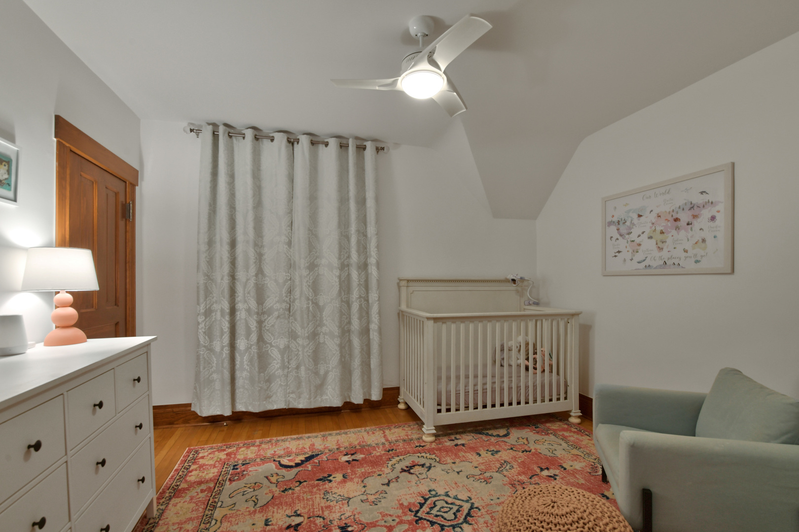 1726 Wesley Avenue Evanston, IL 60201 - Photo 17 of 27 a bedroom with furniture and a window