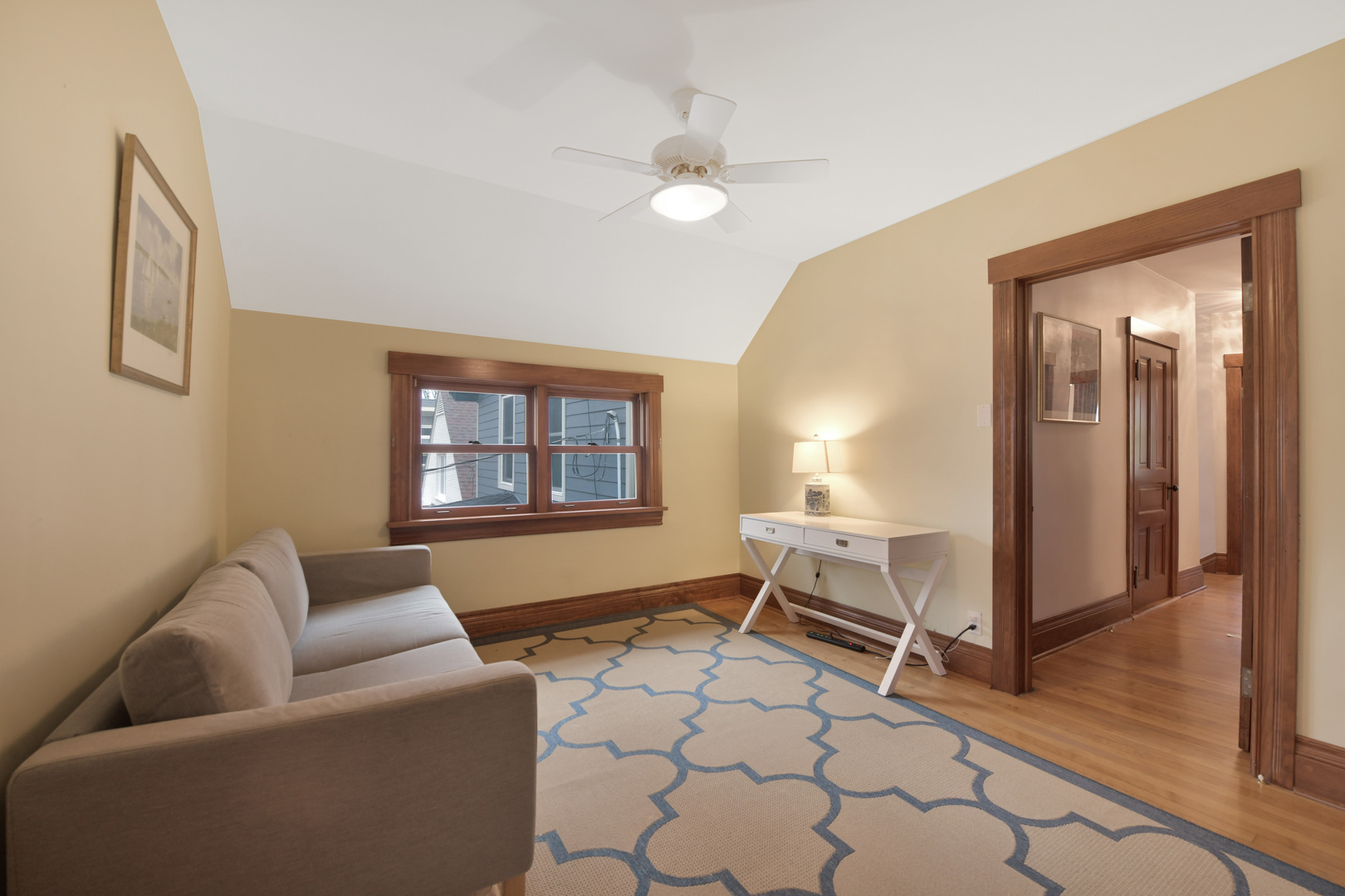 1726 Wesley Avenue Evanston, IL 60201 - Photo 18 of 27 a living room with furniture and a window