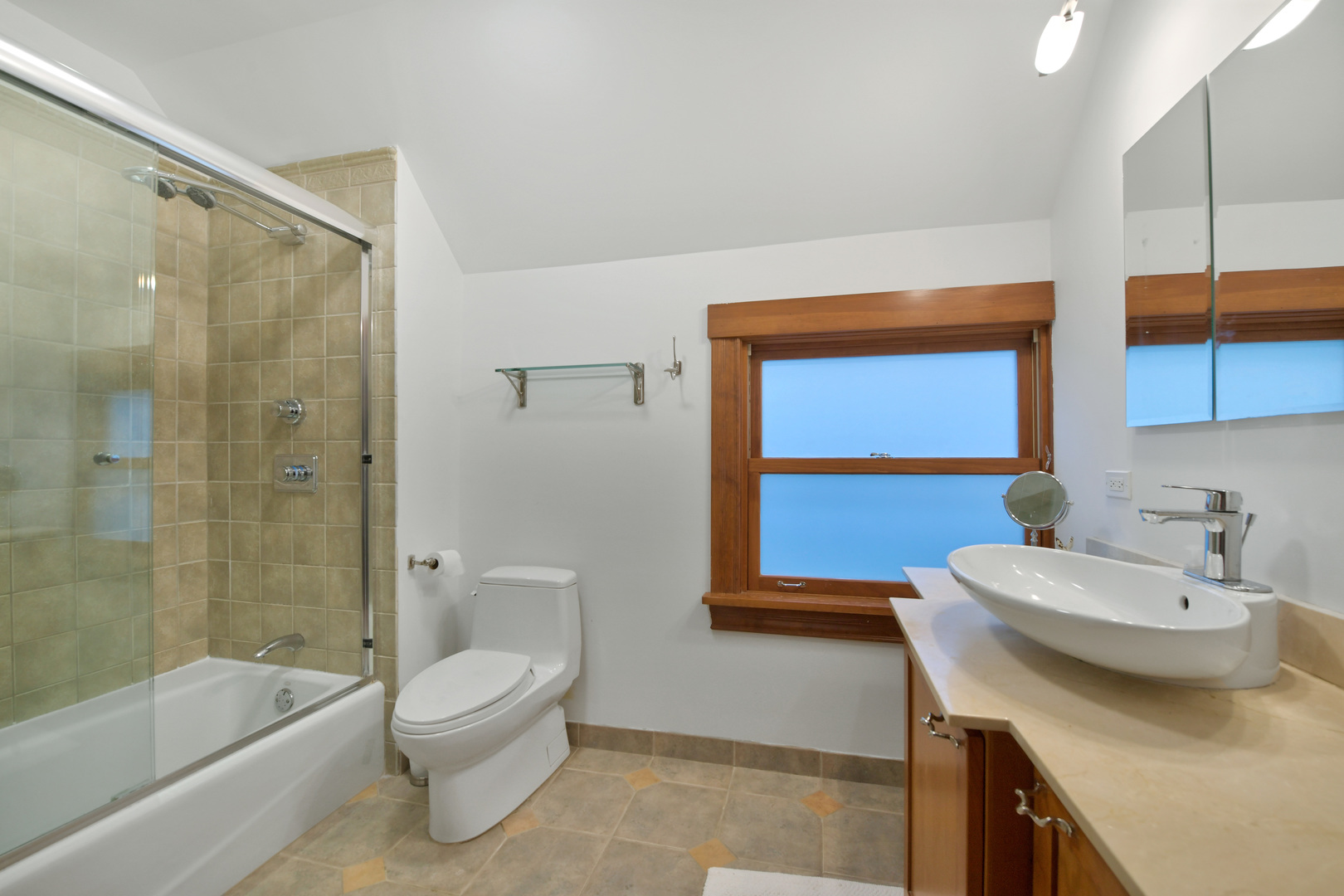 1726 Wesley Avenue Evanston, IL 60201 - Photo 19 of 27 a bathroom with a sink a toilet and shower