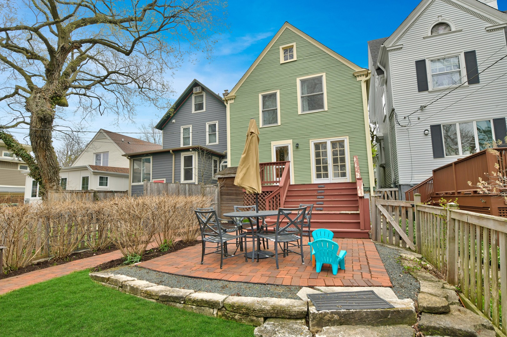 1726 Wesley Avenue Evanston, IL 60201 - Photo 22 of 27 a front view of a house with garden