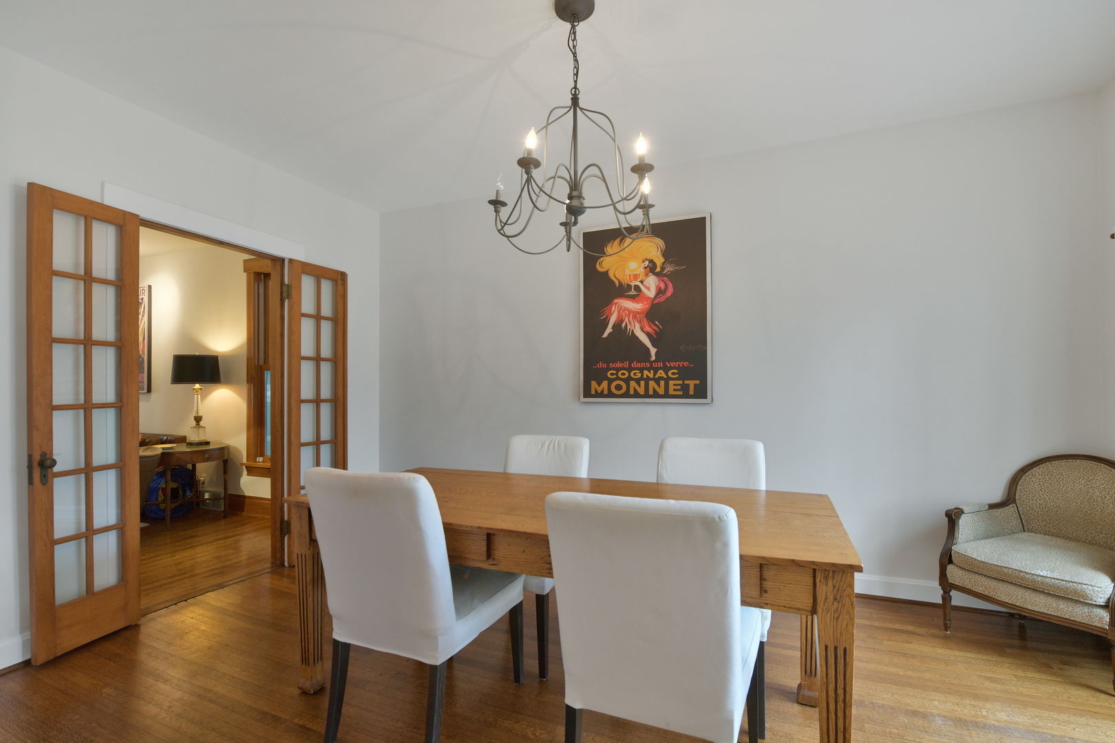 1726 Wesley Avenue Evanston, IL 60201 - Photo 9 of 27 a view of a dining room with furniture wooden floor and a chandelier