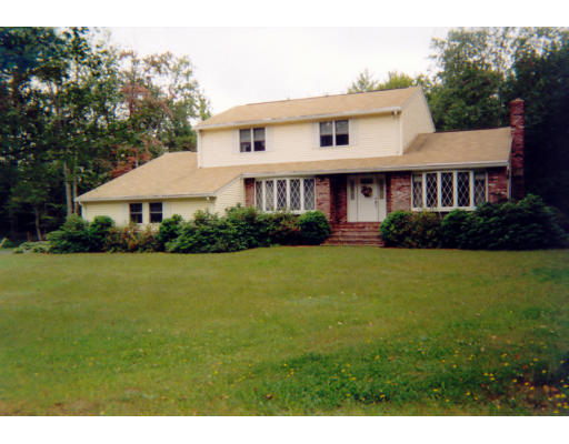 87 Minott Road Gardner, MA 01440 - Photo 1 of 1 a front view of a house with garden