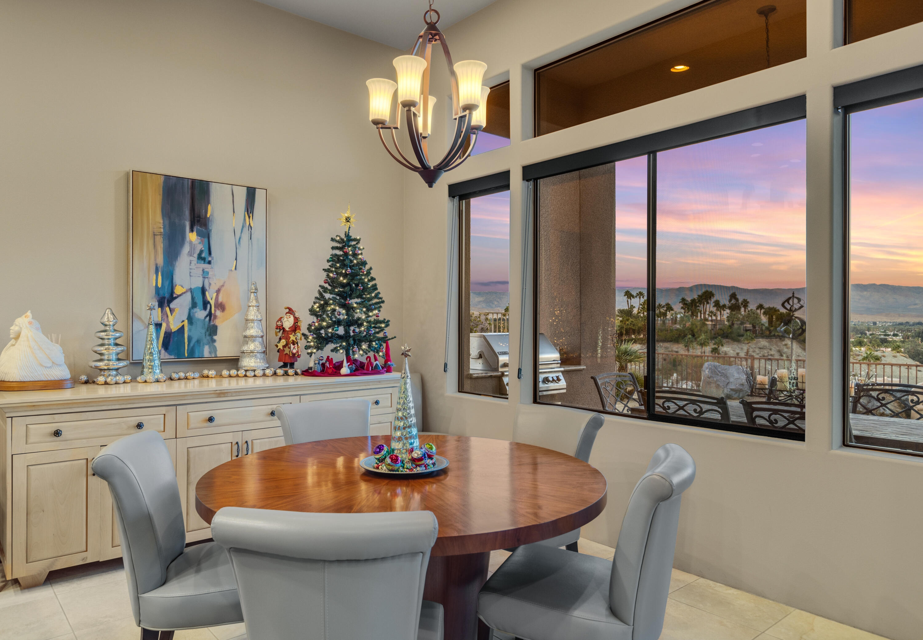 7 Nebulae Way Rancho Mirage, CA 92270 - Photo 12 of 40 a dining room with furniture a chandelier and window