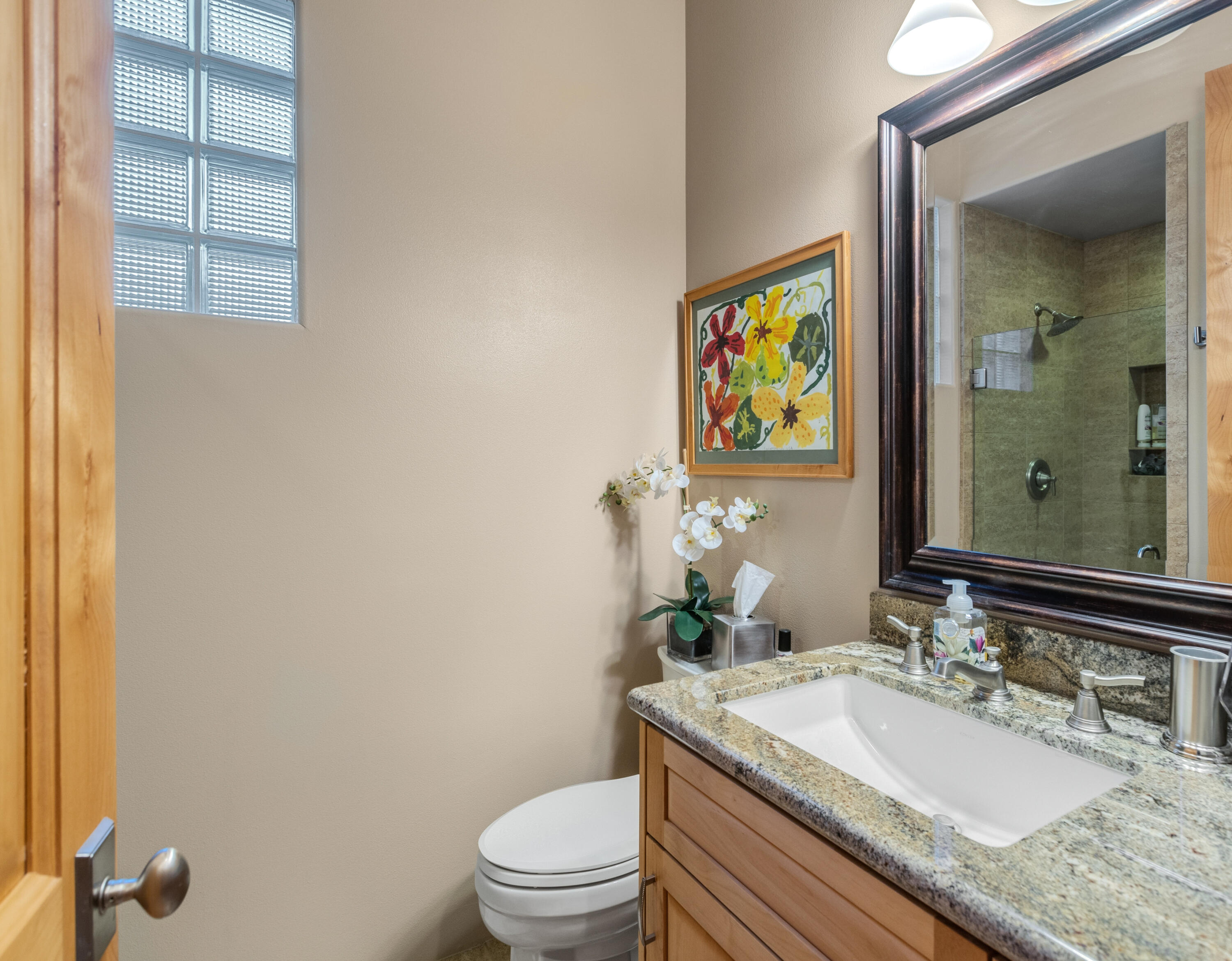 7 Nebulae Way Rancho Mirage, CA 92270 - Photo 20 of 40 a bathroom with a granite countertop sink a toilet and mirror