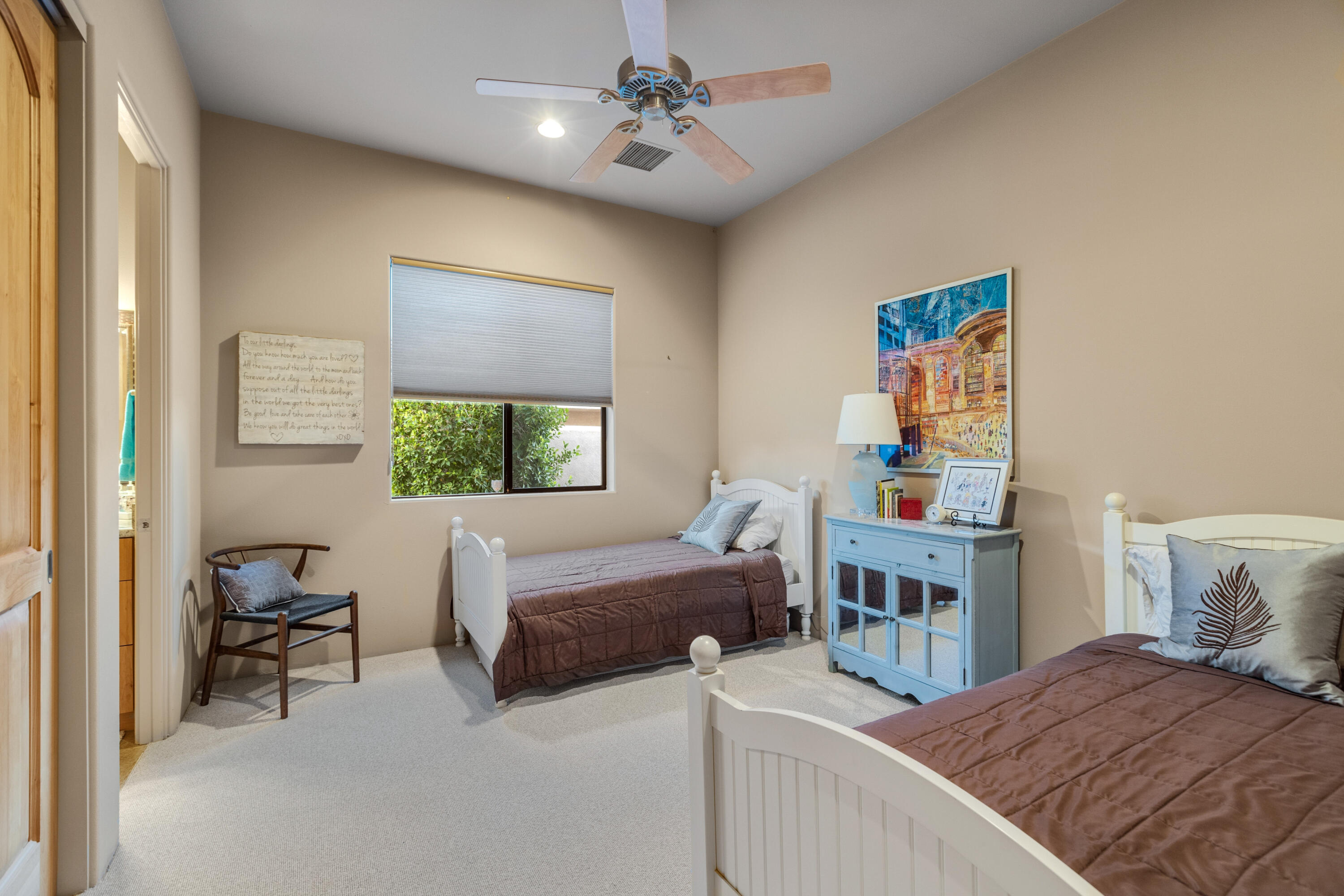 7 Nebulae Way Rancho Mirage, CA 92270 - Photo 21 of 40 a bedroom with furniture and a window