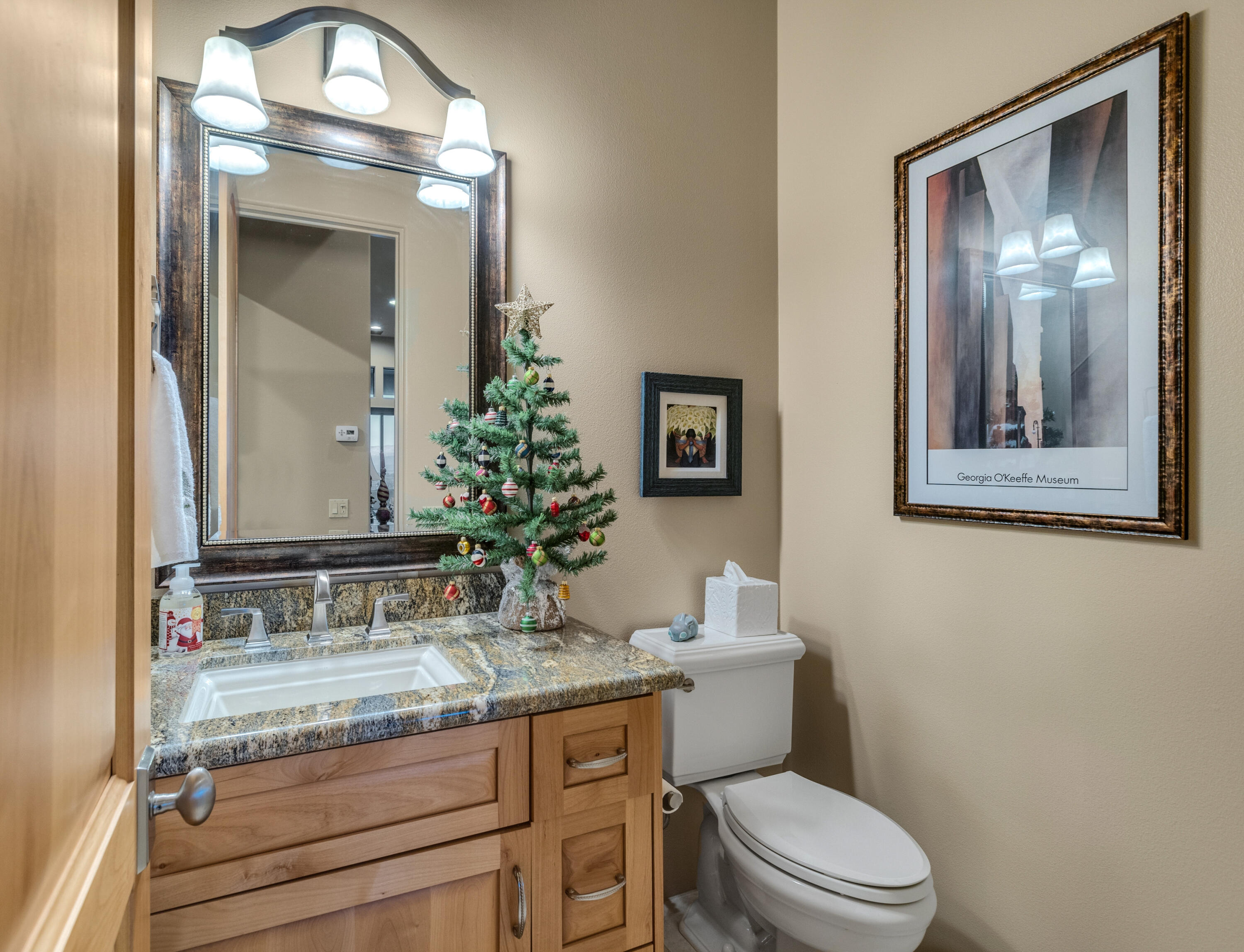 7 Nebulae Way Rancho Mirage, CA 92270 - Photo 23 of 40 a bathroom with a granite countertop toilet a sink and mirror