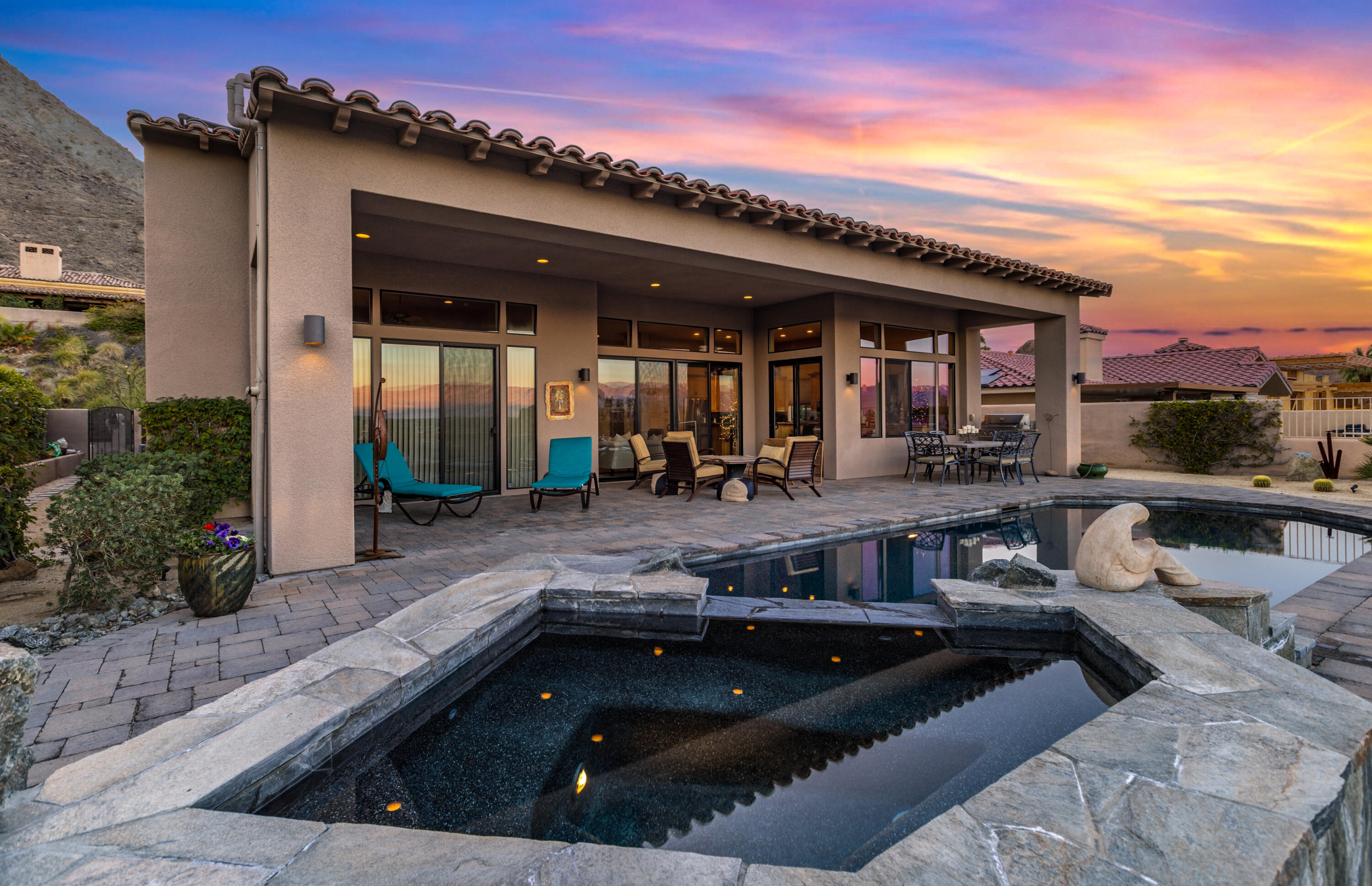 7 Nebulae Way Rancho Mirage, CA 92270 - Photo 28 of 40 a view of a house with a patio