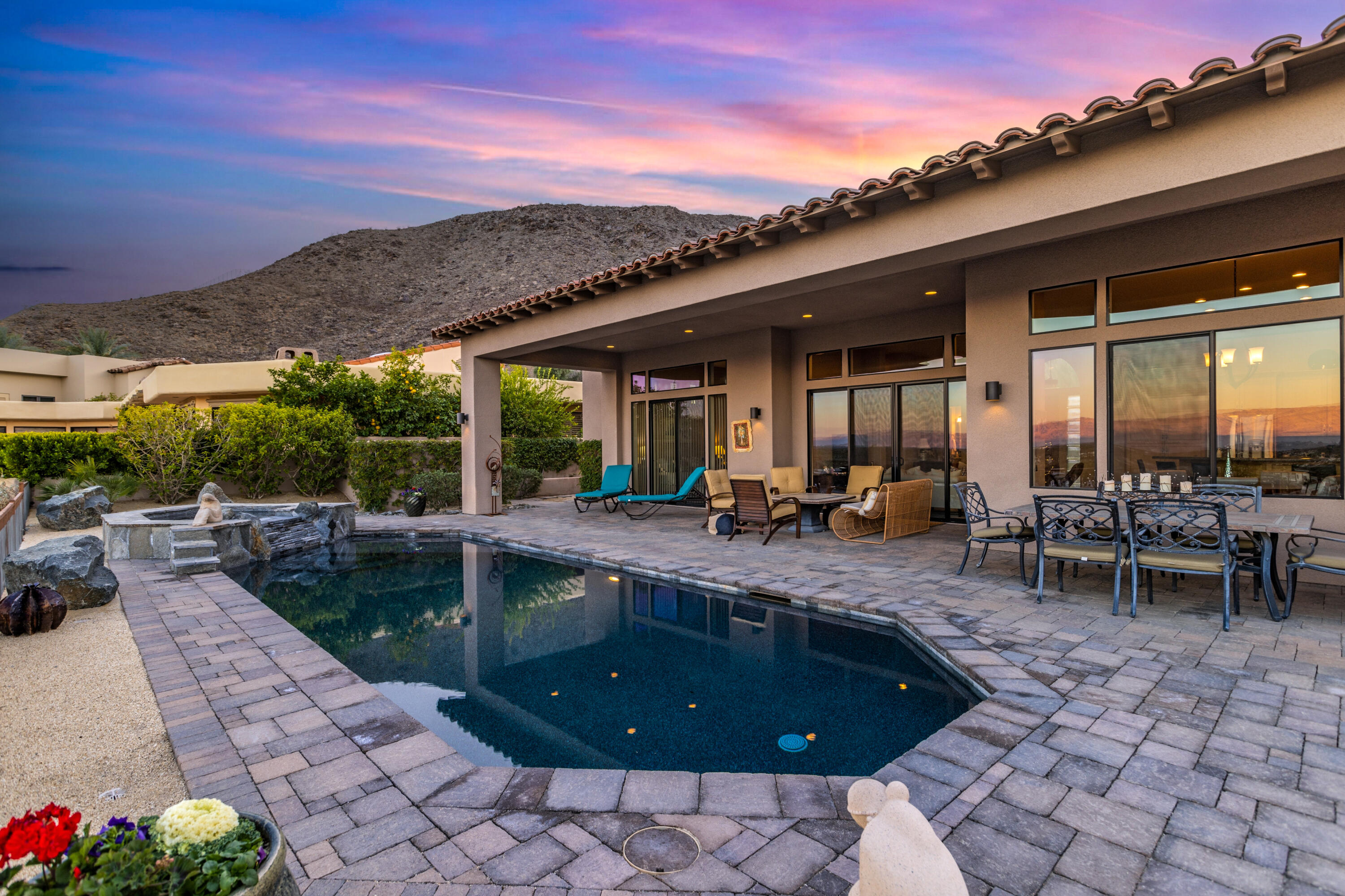 7 Nebulae Way Rancho Mirage, CA 92270 - Photo 29 of 40 a view of a backyard with sitting area