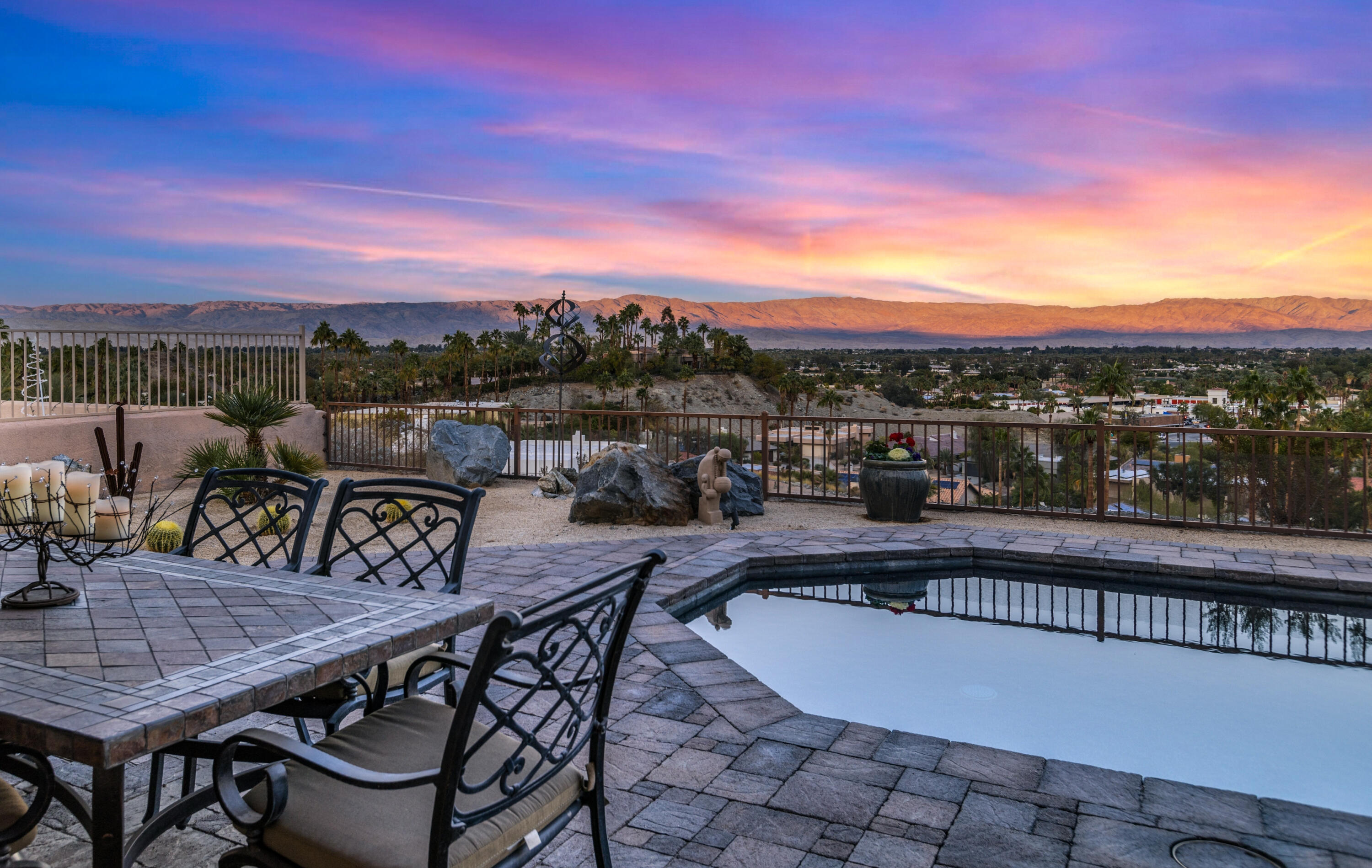 7 Nebulae Way Rancho Mirage, CA 92270 - Photo 30 of 40 a view of a chairs and table in the balcony