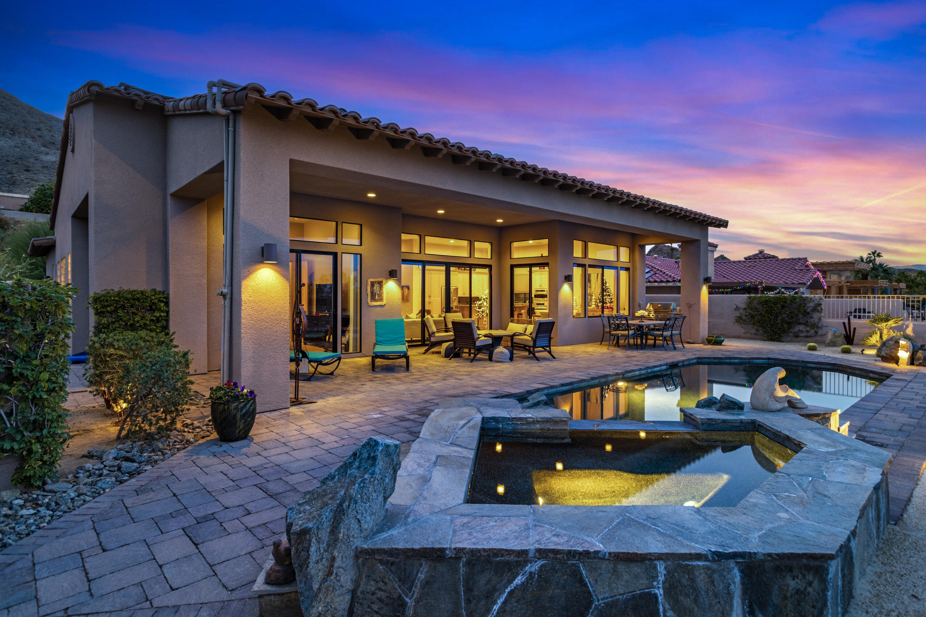 7 Nebulae Way Rancho Mirage, CA 92270 - Photo 36 of 40 a view of a house with swimming pool and sitting area