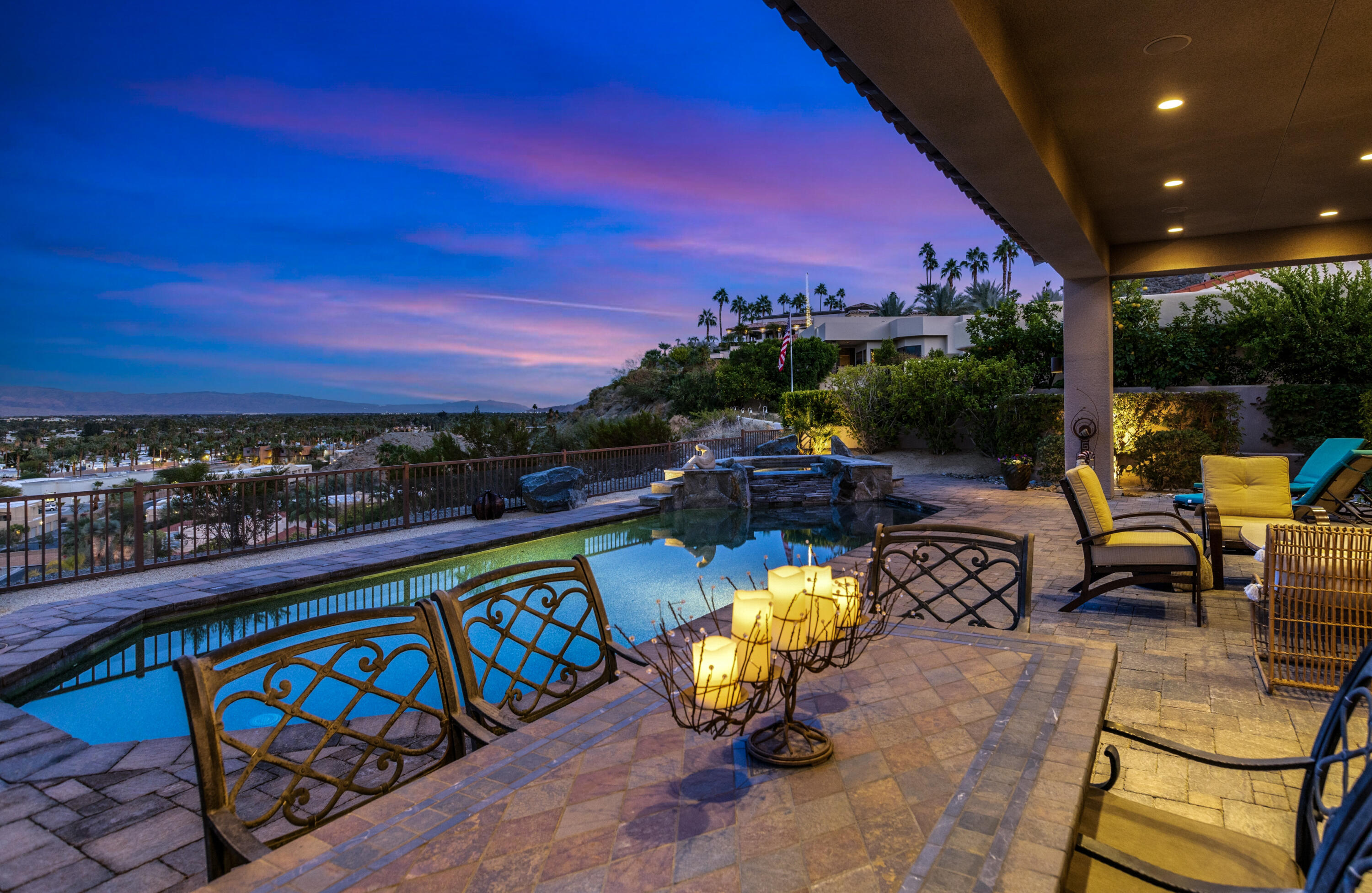 7 Nebulae Way Rancho Mirage, CA 92270 - Photo 39 of 40 a view of a swimming pool with a lounge chair and the floor
