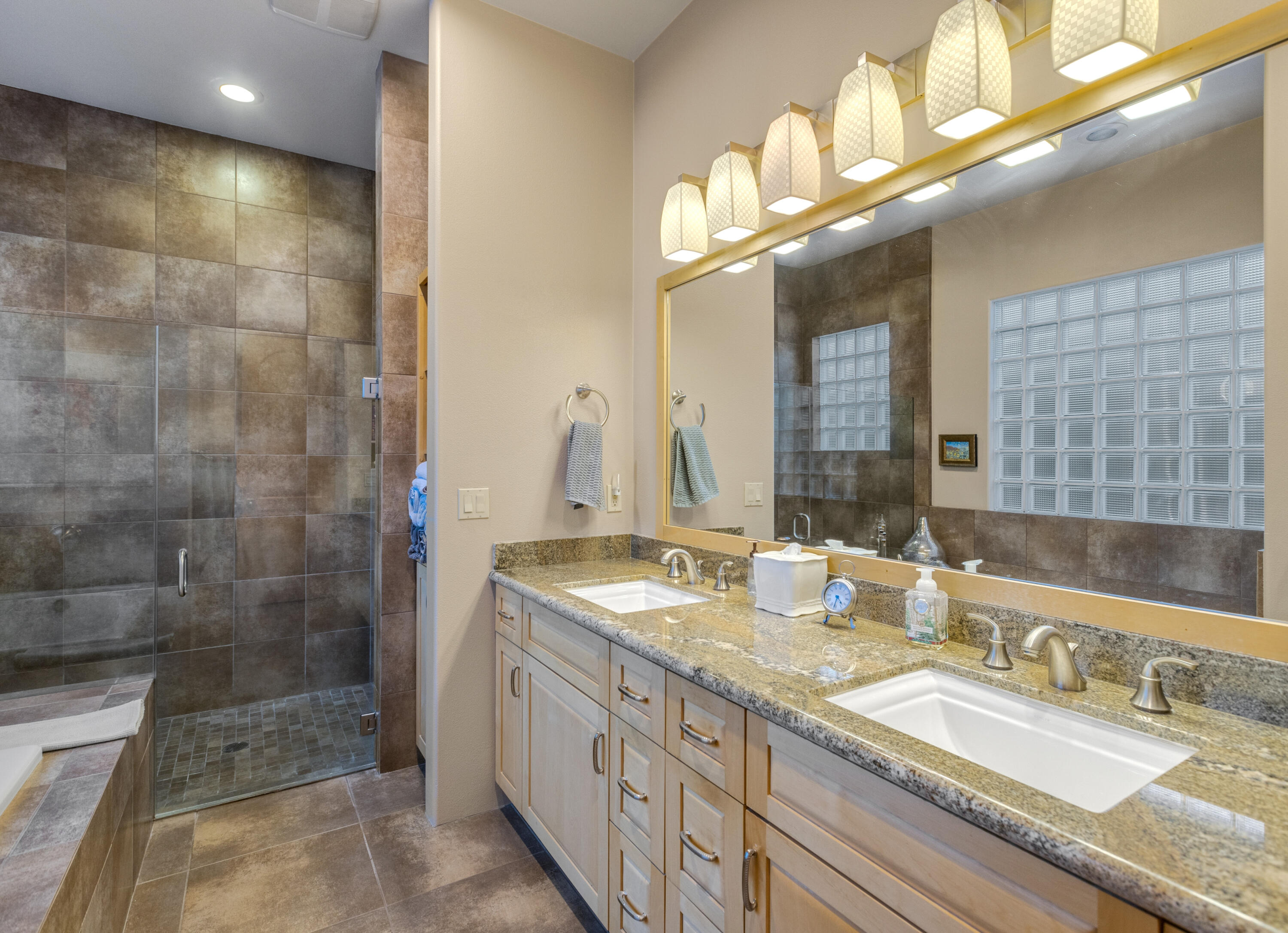 7 Nebulae Way Rancho Mirage, CA 92270 - Photo 5 of 40 a bathroom with double vanity and a mirror