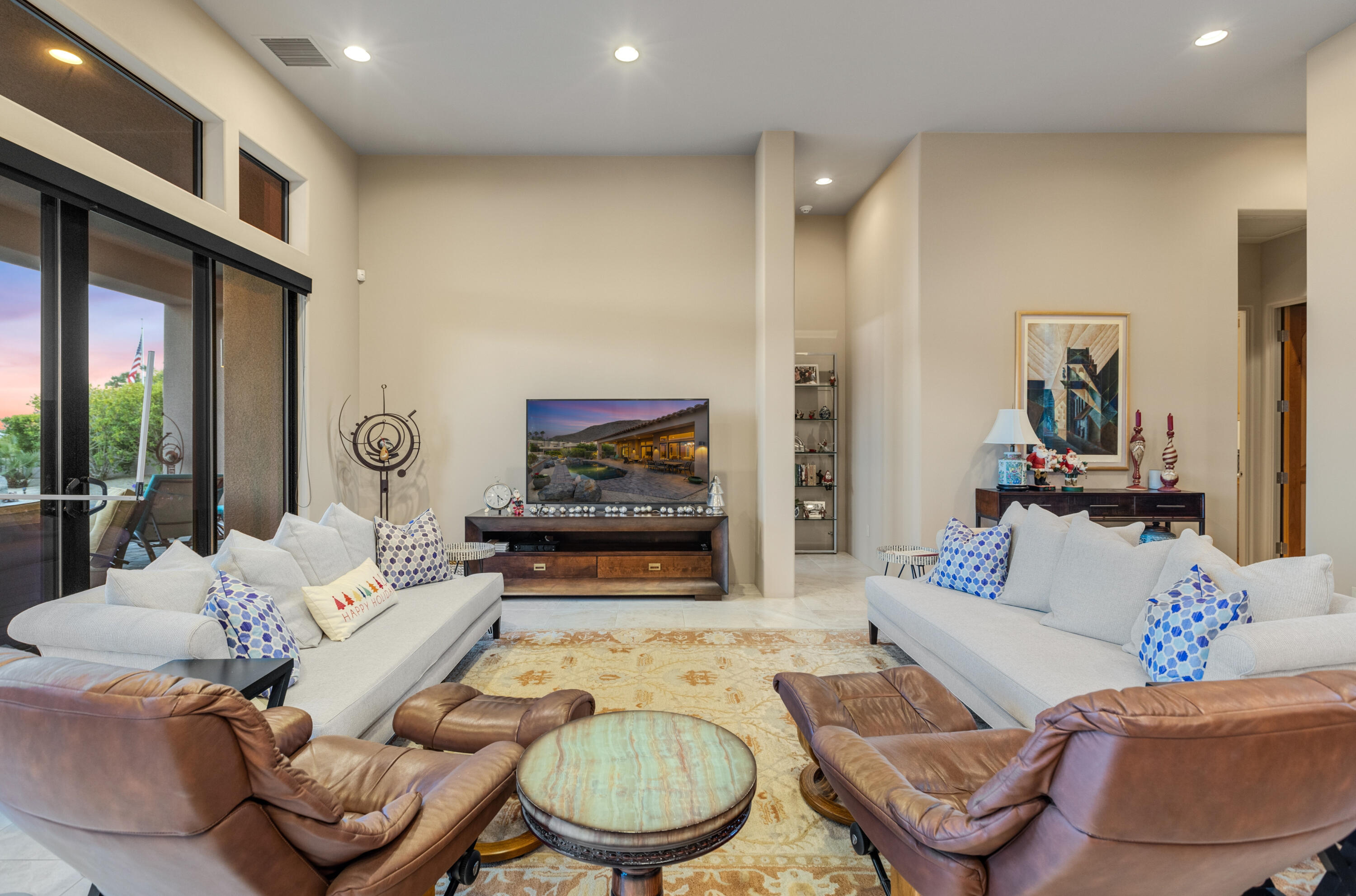 7 Nebulae Way Rancho Mirage, CA 92270 - Photo 8 of 40 a living room with furniture and a fireplace