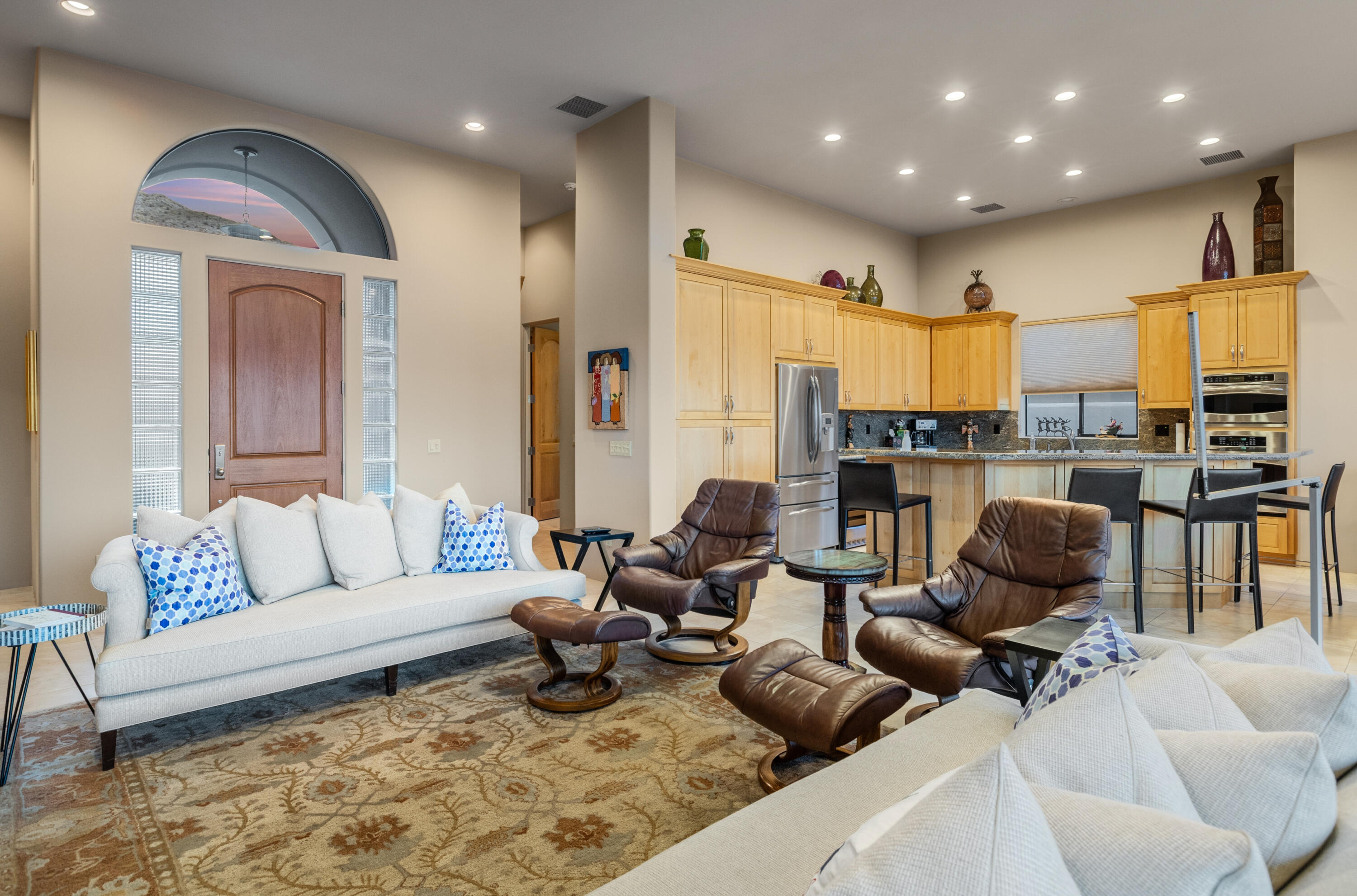 7 Nebulae Way Rancho Mirage, CA 92270 - Photo 9 of 40 a living room with furniture kitchen view and a chandelier