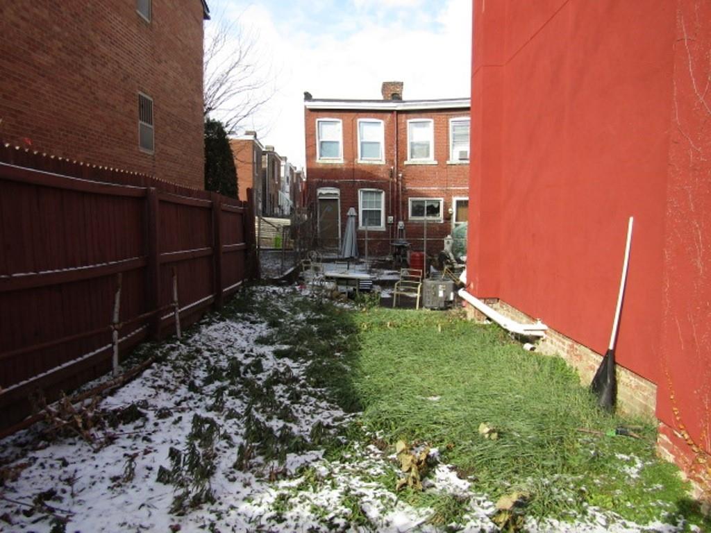 0 Plummer Street Pittsburgh, PA 15201 - Photo 3 of 6 a backyard of a house with yard and outdoor seating