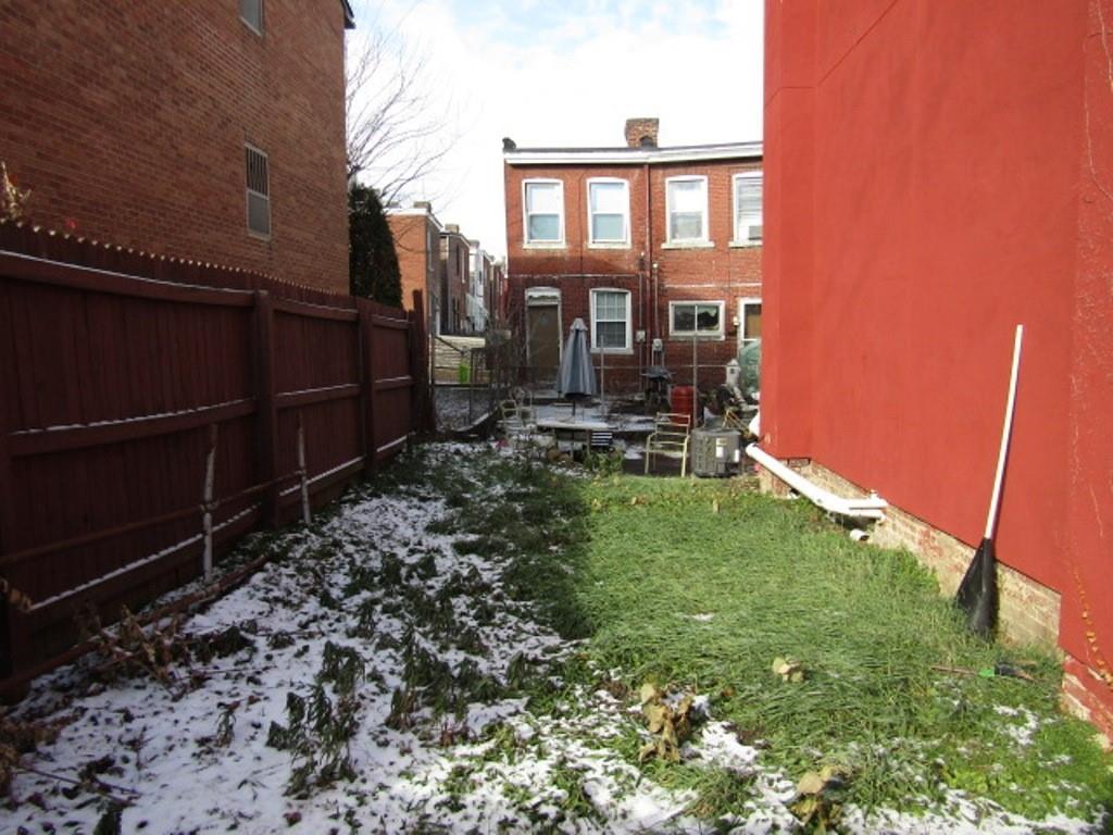 0 Plummer Street Pittsburgh, PA 15201 - Photo 4 of 6 a backyard of a house with yard and outdoor seating