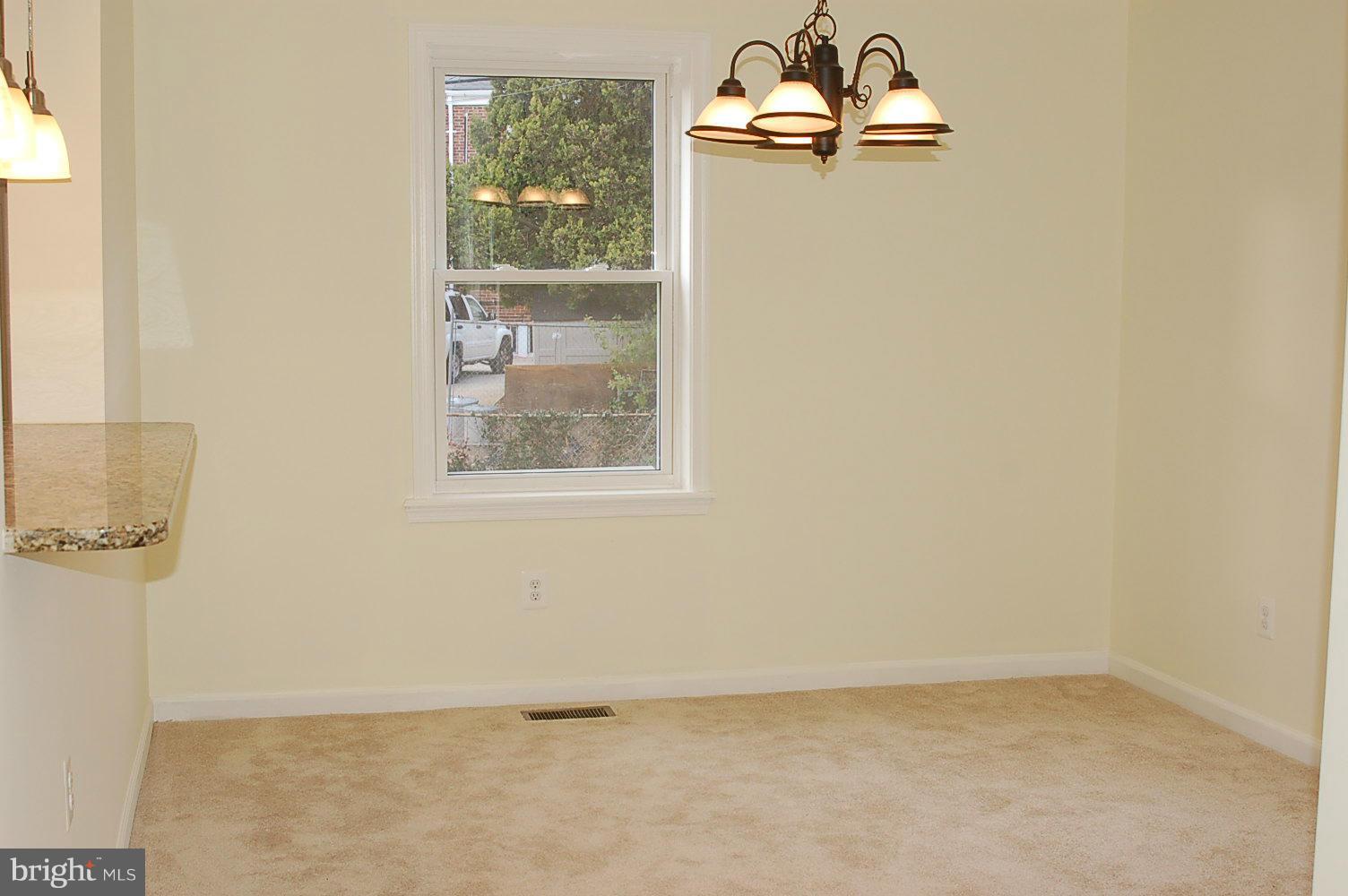 4016 Hilton Road Baltimore, MD 21215 - Photo 13 of 30 Formal dining room