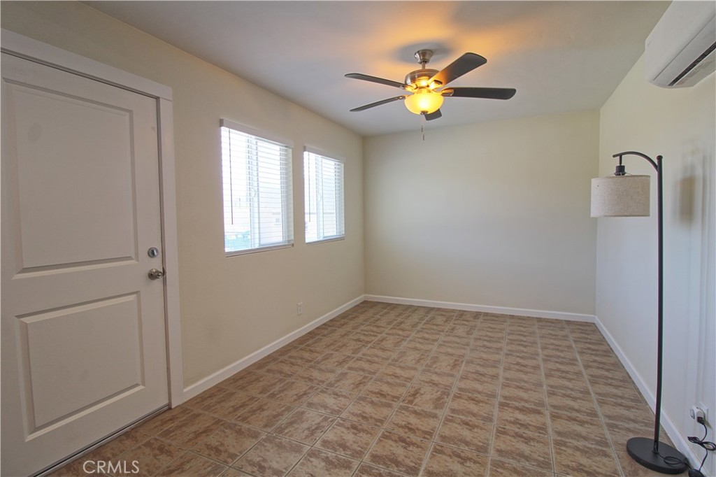 719 East Ramsey Street, Unit 3 Banning, CA 92220 - Photo 3 of 7 a view of an empty room with window
