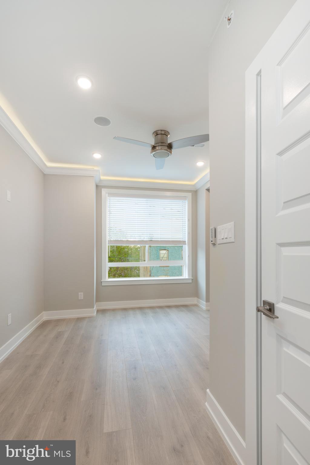 2530 North Howard Street, Unit 2 Philadelphia, PA 19133 - Photo 12 of 22 a view of an empty room with a window