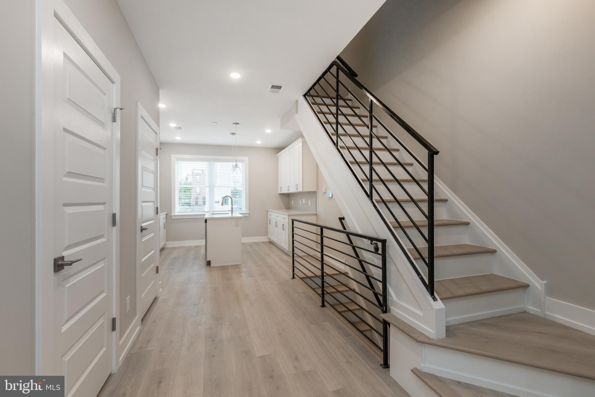 2530 North Howard Street, Unit 2 Philadelphia, PA 19133 - Photo 6 of 22 a view of entryway and hall with wooden floor