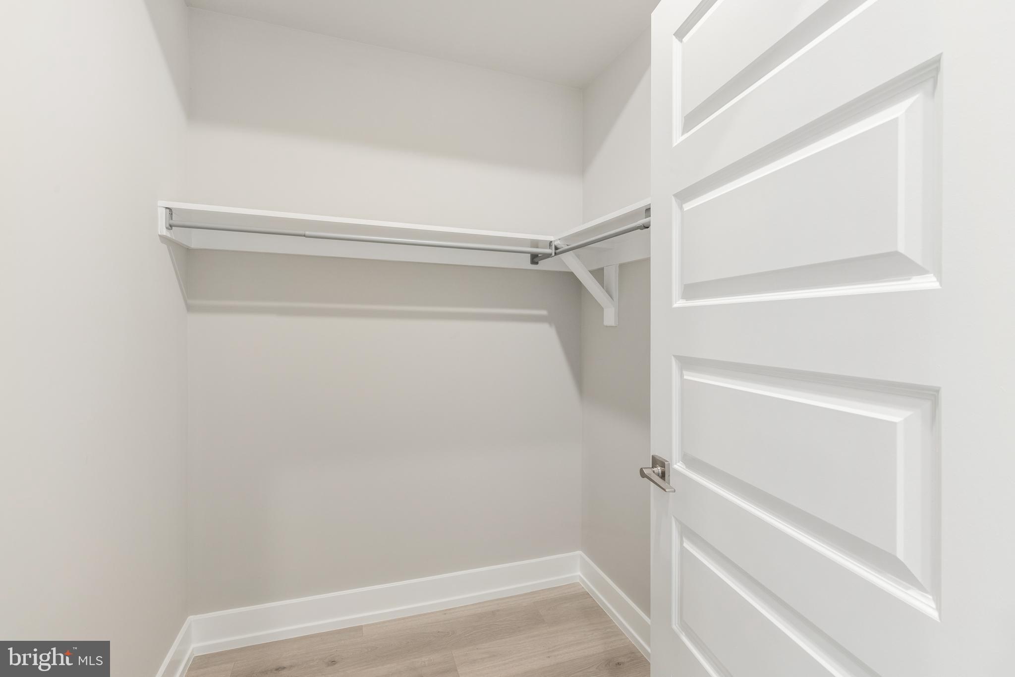 2530 North Howard Street, Unit 2 Philadelphia, PA 19133 - Photo 9 of 22 a view of walk in closet with empty racks