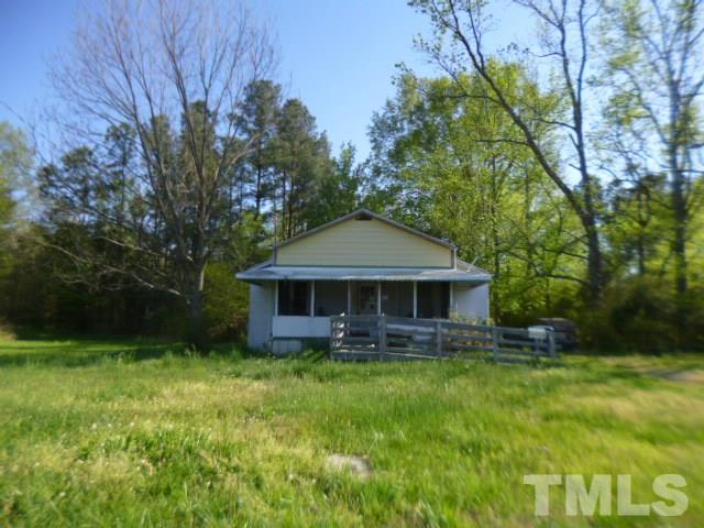 508 Belgreen Road Durham, NC 27713 - Photo 1 of 7 a front view of house with yard and green space