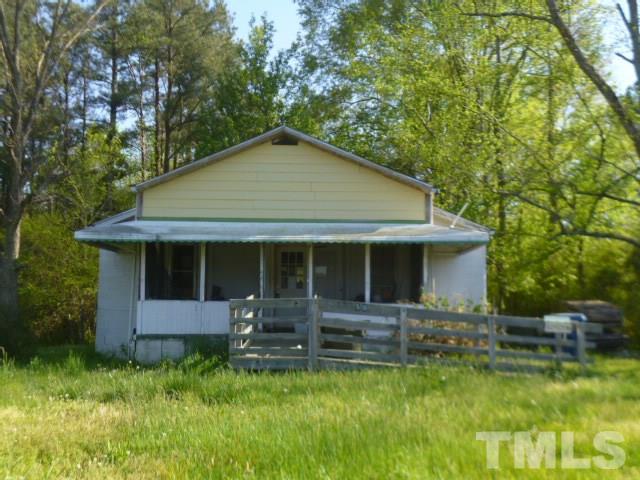 508 Belgreen Road Durham, NC 27713 - Photo 2 of 7 a backyard of a house with yard and outdoor seating