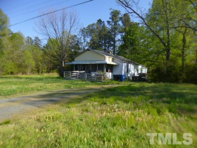 508 Belgreen Road Durham, NC 27713 - Photo 3 of 7 a view of a house with a yard