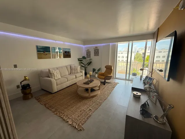 a workspace with furniture and window