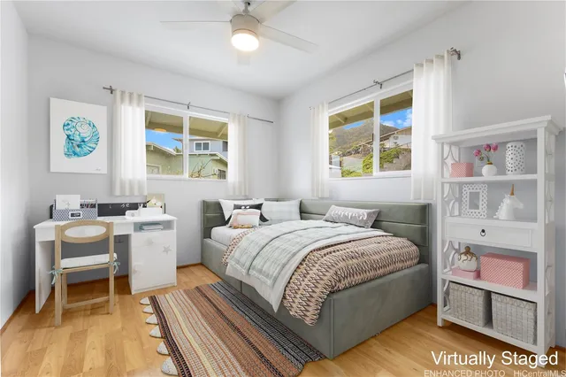 a bedroom with a bed and a table