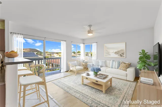 a living room with furniture and a table