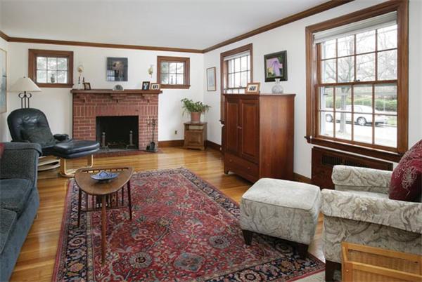 20 Hallron Road Newton, MA 02462 - Photo 3 of 5 a living room with furniture and a fireplace