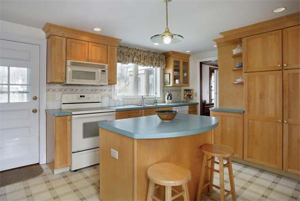 20 Hallron Road Newton, MA 02462 - Photo 5 of 5 a kitchen with stainless steel appliances granite countertop a sink a refrigerator and a stove