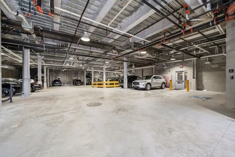 a view of parking area with parking space