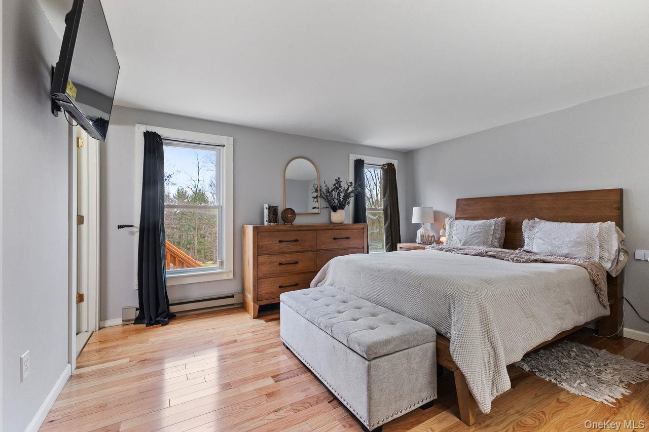 4 Stonewall Farm Road Mahopac, NY 10541 - Photo 17 of 36 Large primary bedroom with new hardwood floors.