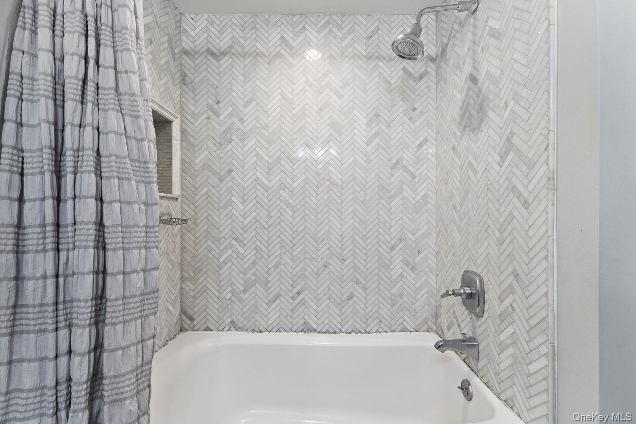 4 Stonewall Farm Road Mahopac, NY 10541 - Photo 22 of 36 Beautiful herringbone tiled shower/tub combo.