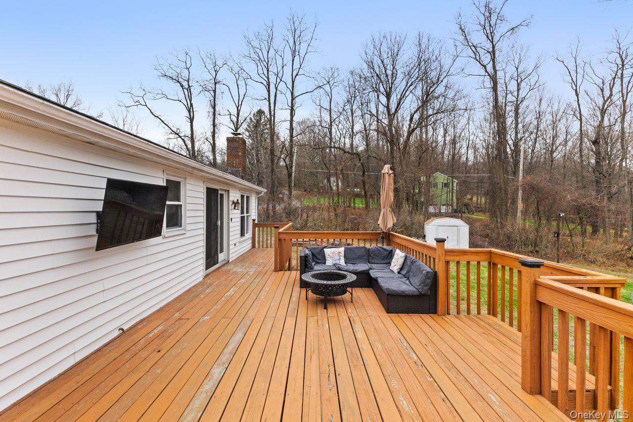 4 Stonewall Farm Road Mahopac, NY 10541 - Photo 34 of 36 Large deck off main floor overlooking yard.