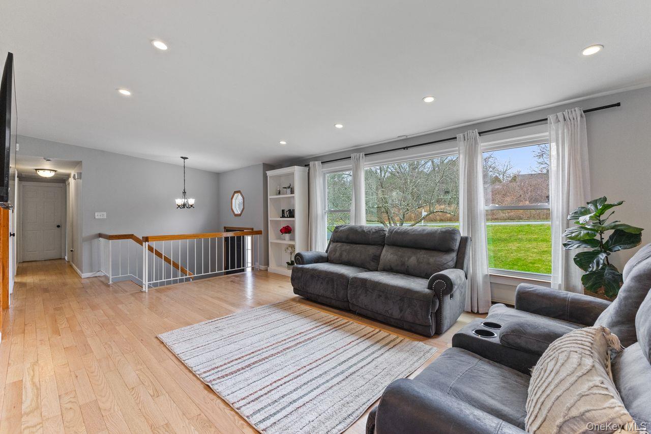4 Stonewall Farm Road Mahopac, NY 10541 - Photo 4 of 36 Main floor living room with plenty of natural light and refinished hardwood floors.