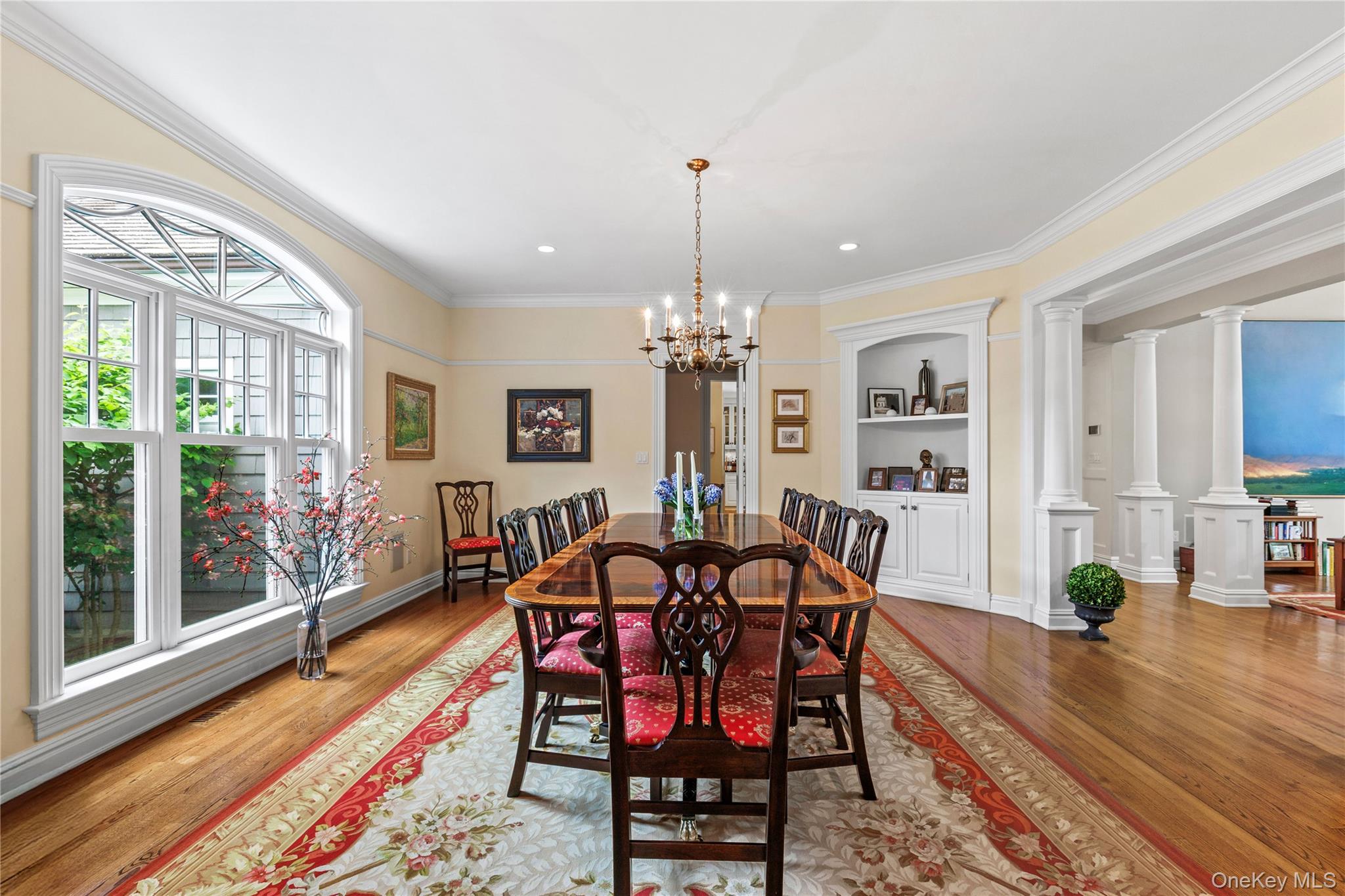 63 Old Mill River Road Pound Ridge, NY 10576 - Photo 13 of 47 a view of a dining room with furniture window and wooden floor