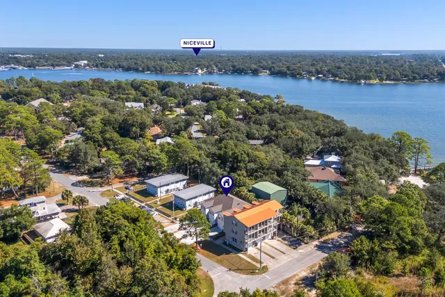 an aerial view of a houses with outdoor space